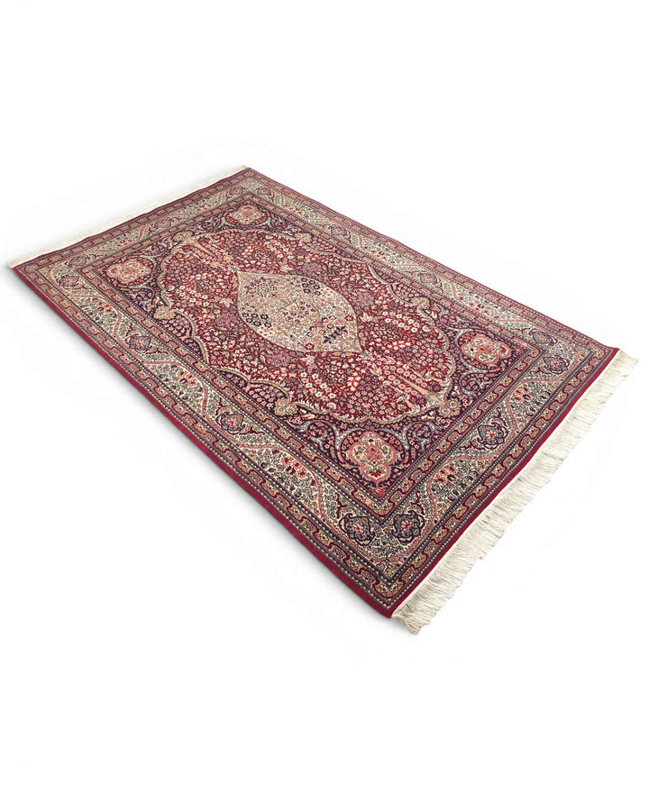 One-of-a-kind deep ruby red medallion Tabriz Pakistani rug