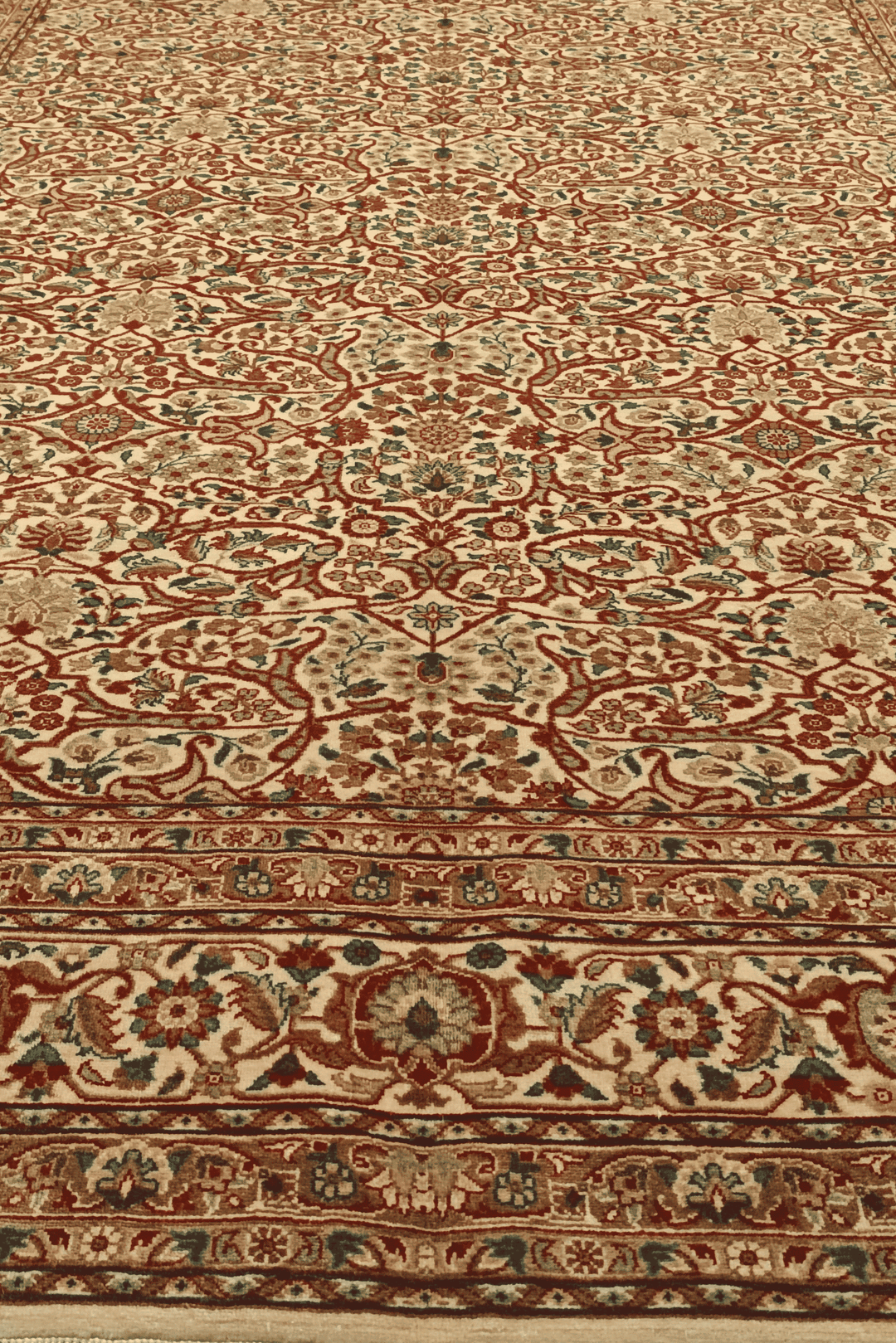 Fringe of cream and red floral lattice hand-knotted rug