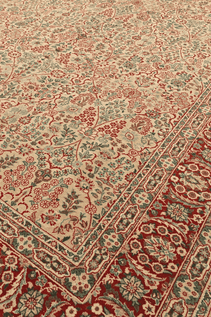 Tabriz floral detail in cream and red on Pakistani rug