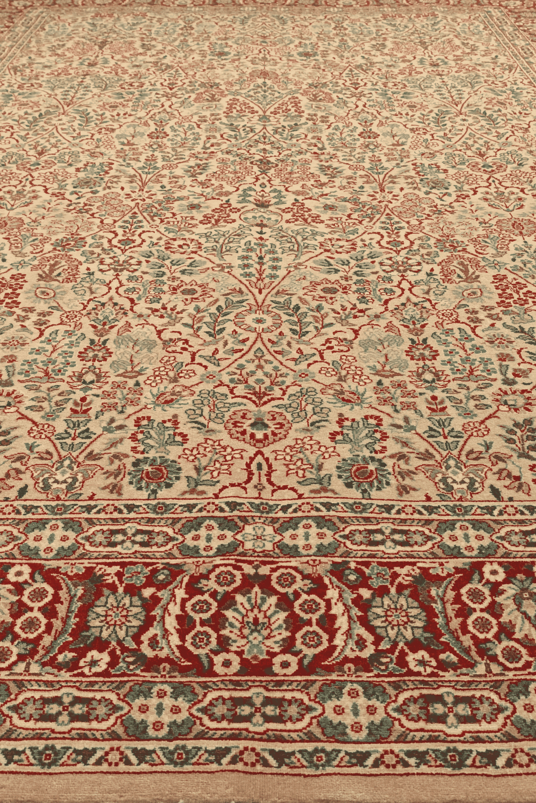 Fringe of cream and red Tabriz hand-knotted rug