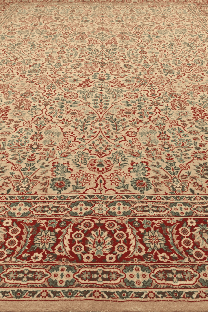 Fringe of cream and red Tabriz hand-knotted rug