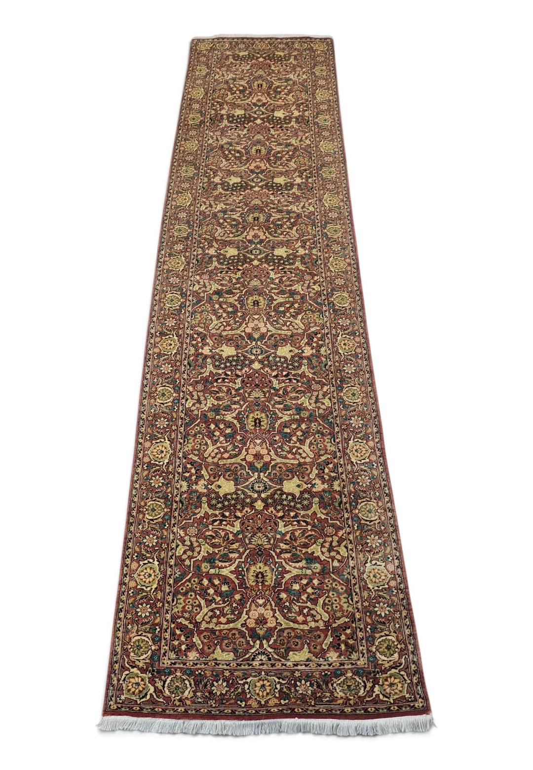 Border detail of brick red Shah Abbasi hand-knotted runner