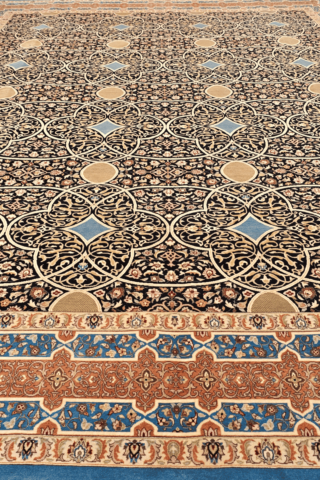 Hand-knotted espresso rug with peach circle lattice field