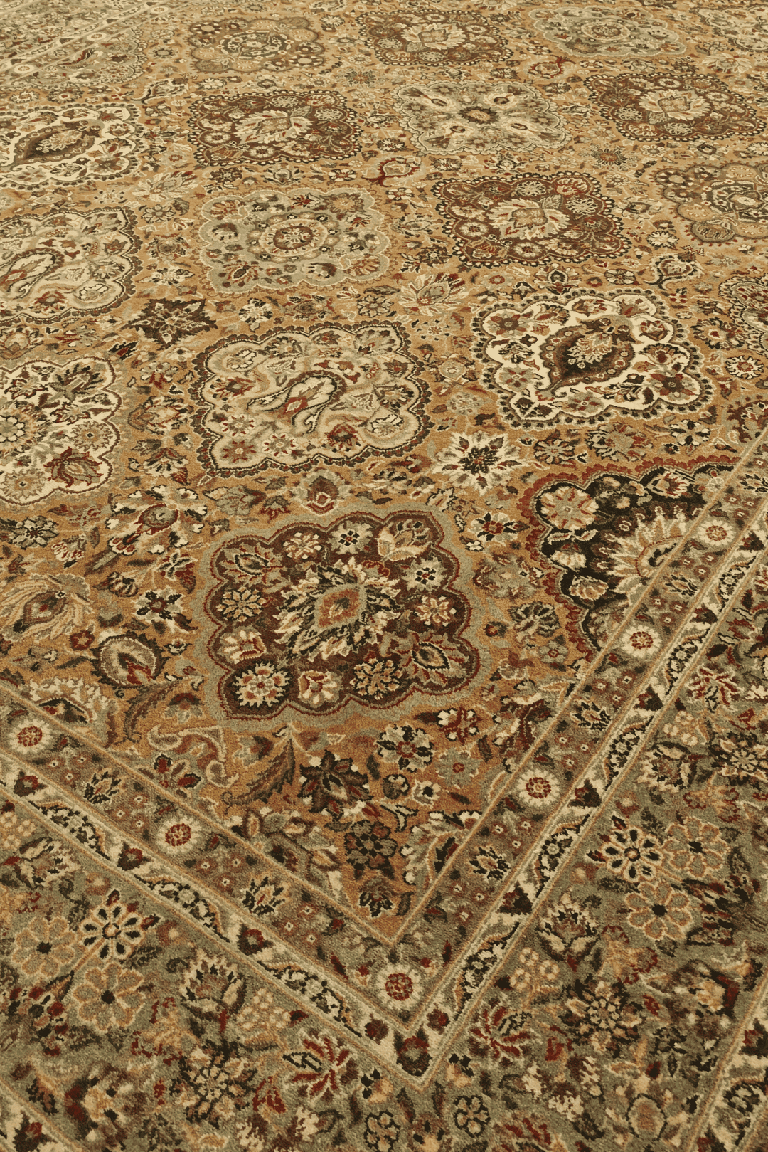 Afshan repeating floral detail in gold and sage on Pakistani rug