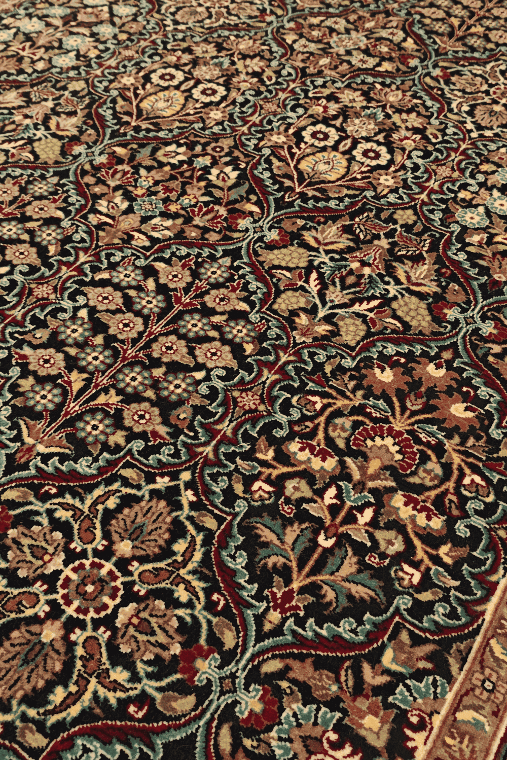 Paradise garden floral detail on Tabriz Pakistani rug