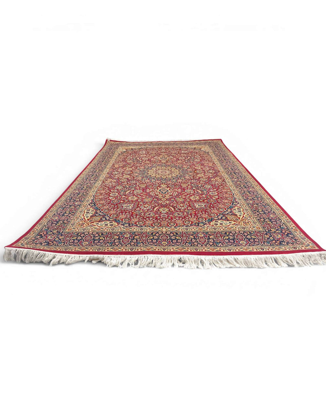 Fringe of garnet and navy Tabriz hand-knotted rug