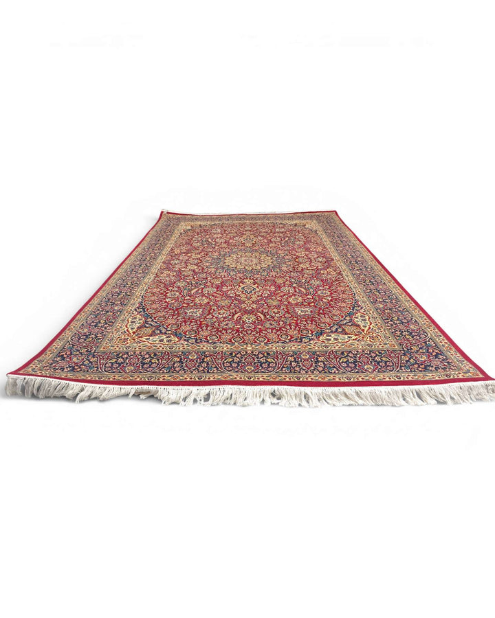Fringe of garnet and navy Tabriz hand-knotted rug