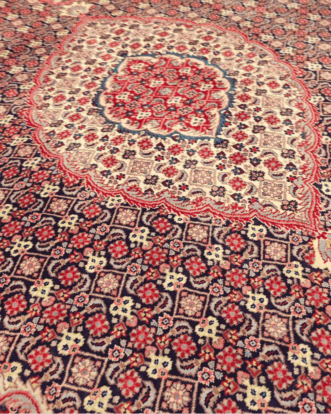 Rosewood mahi Tabriz rug detail, Pakistani double-knot weave