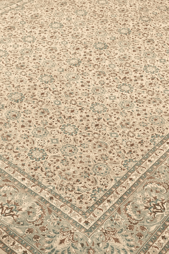 Hereke floral detail in wheat and sage on Pakistani rug