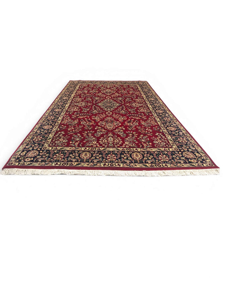 Corner of wine navy Tabriz Pakistani double-knot rug