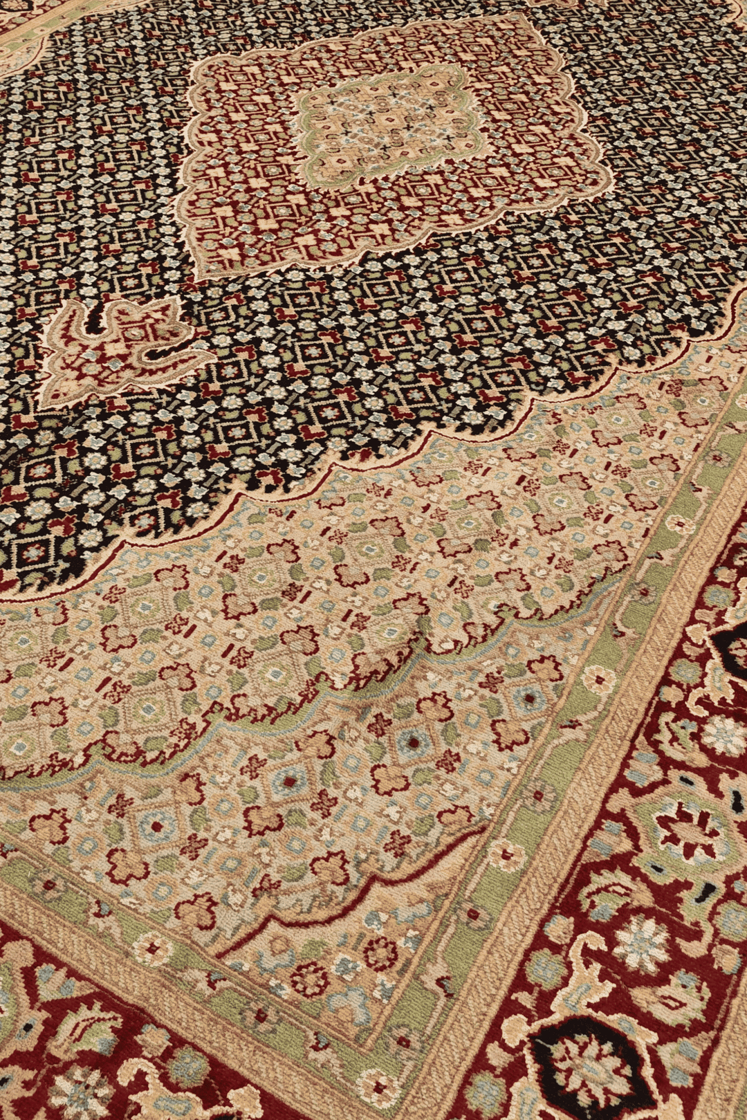 Tabriz mahi detail in navy and cream on wool and silk rug