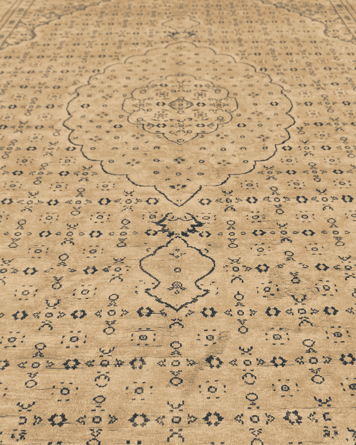 Corner of champagne silk mahi Pakistani rug