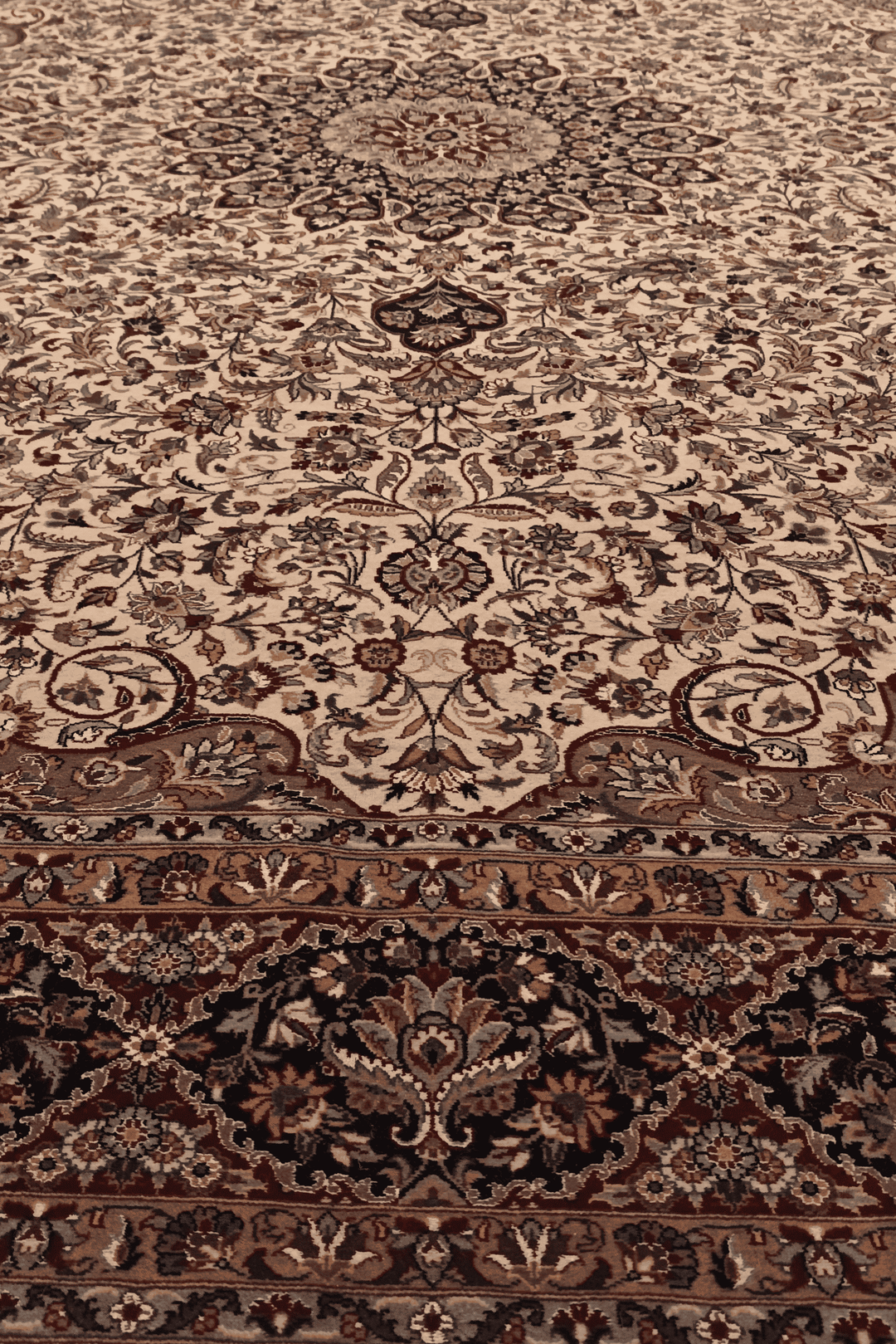 Fringe of ivory and navy Shah Abbasi wool and silk rug