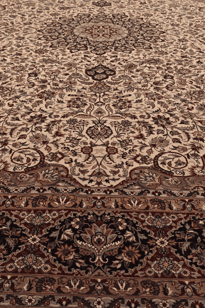 Fringe of ivory and navy Shah Abbasi wool and silk rug