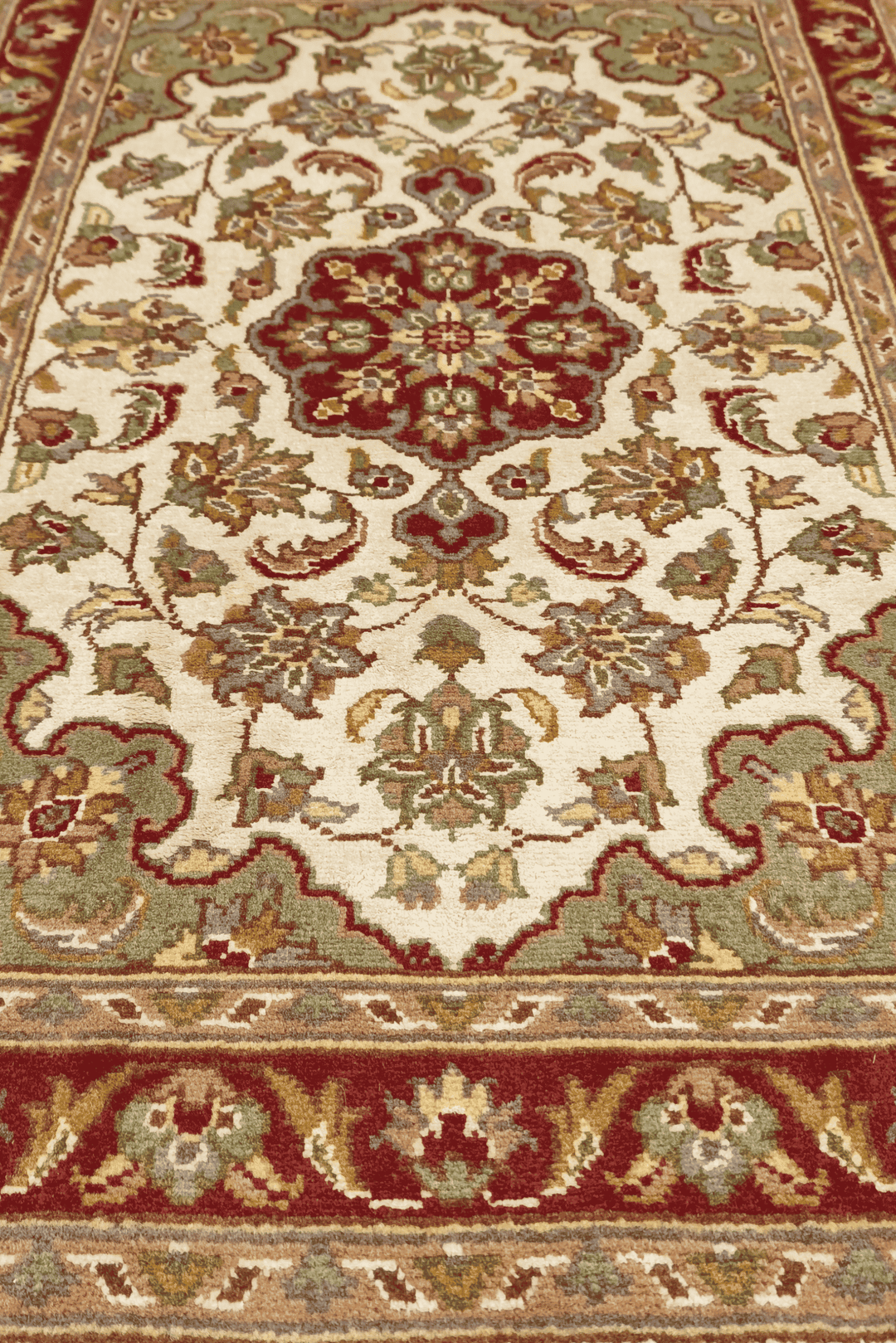 Hand-knotted ivory Tabriz rug with silk deep red medallion