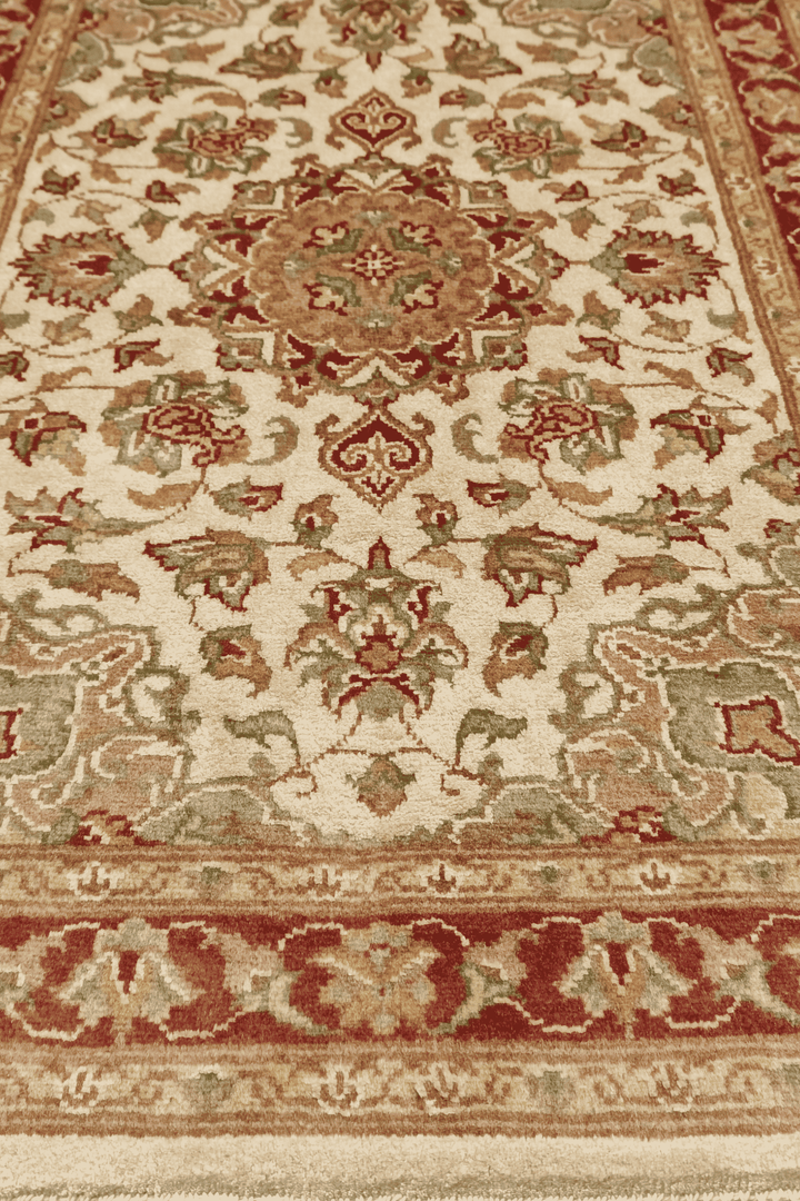 One-of-a-kind ivory and deep red Tabriz cloud band rug
