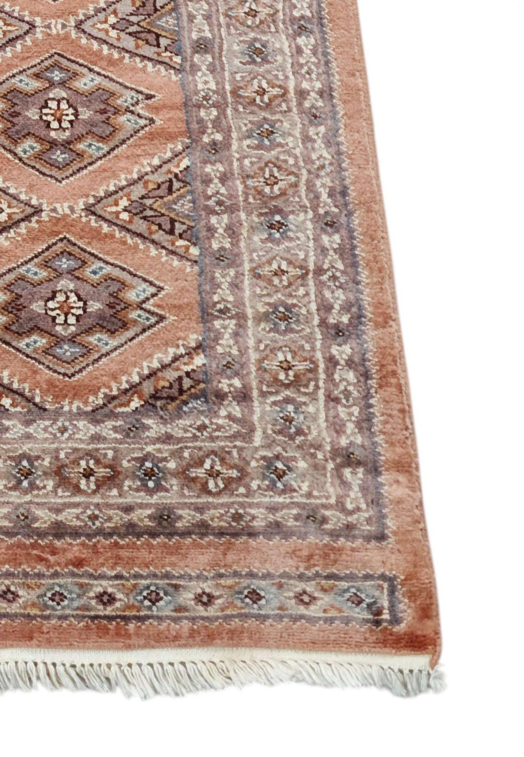 Corner of salmon and mauve Jaldar hand-knotted runner
