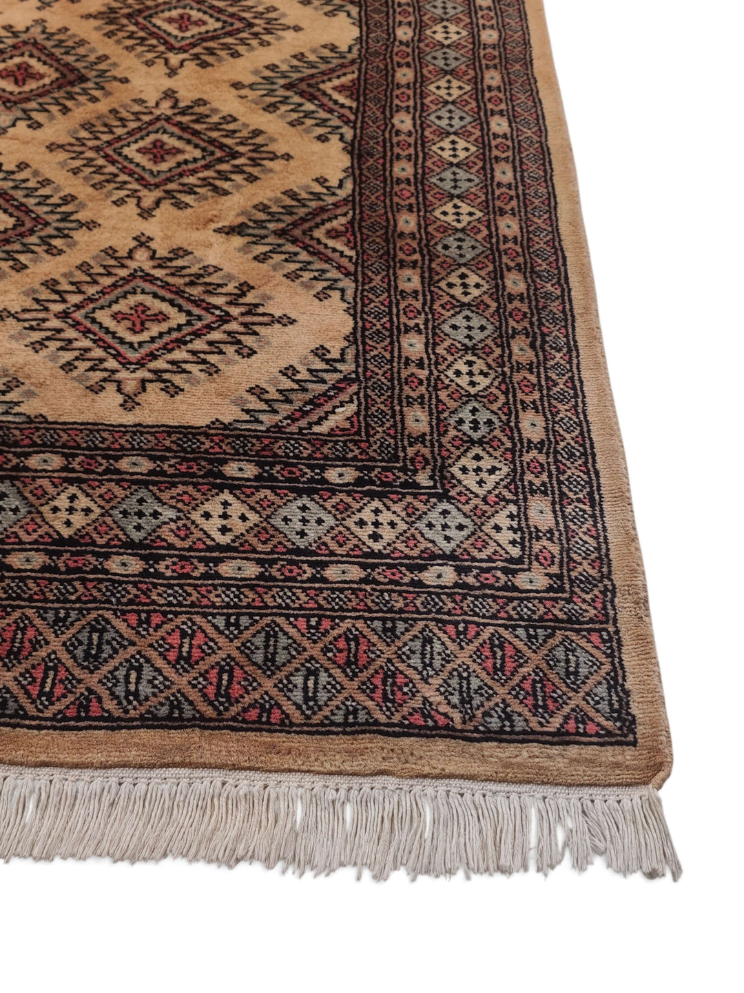 Hand-knotted cream Jaldar rug with brown stepped diamonds