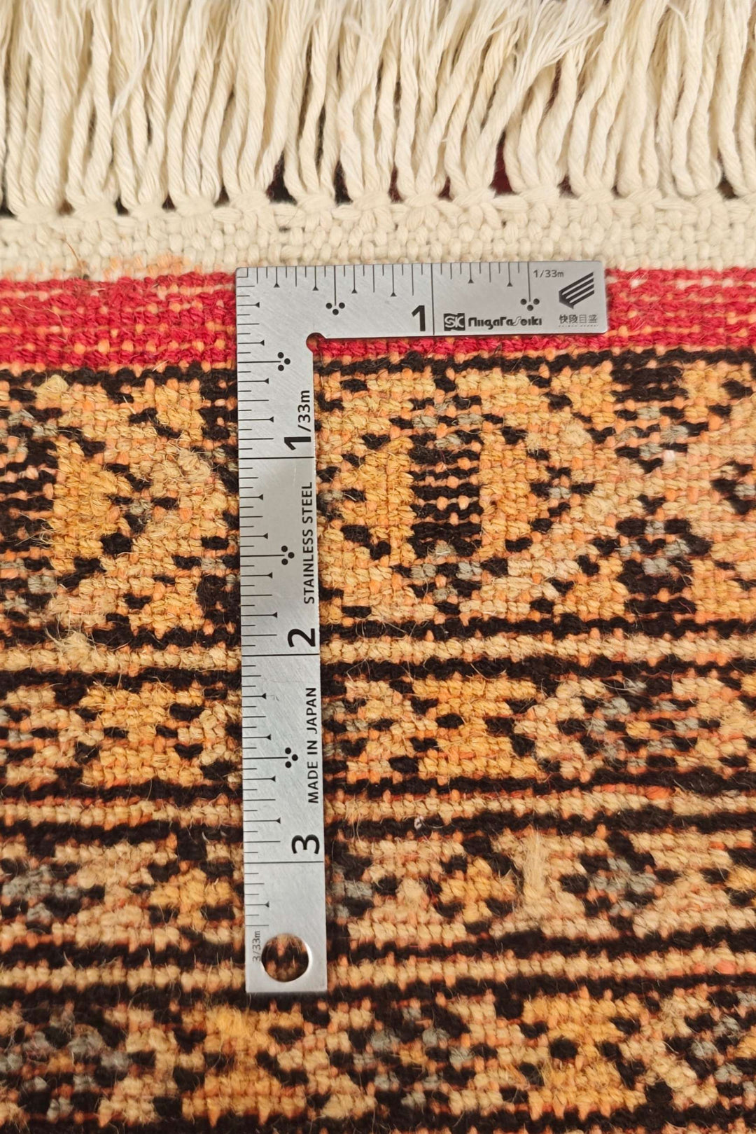 Hand-knotted red Jaldar rug with central medallion