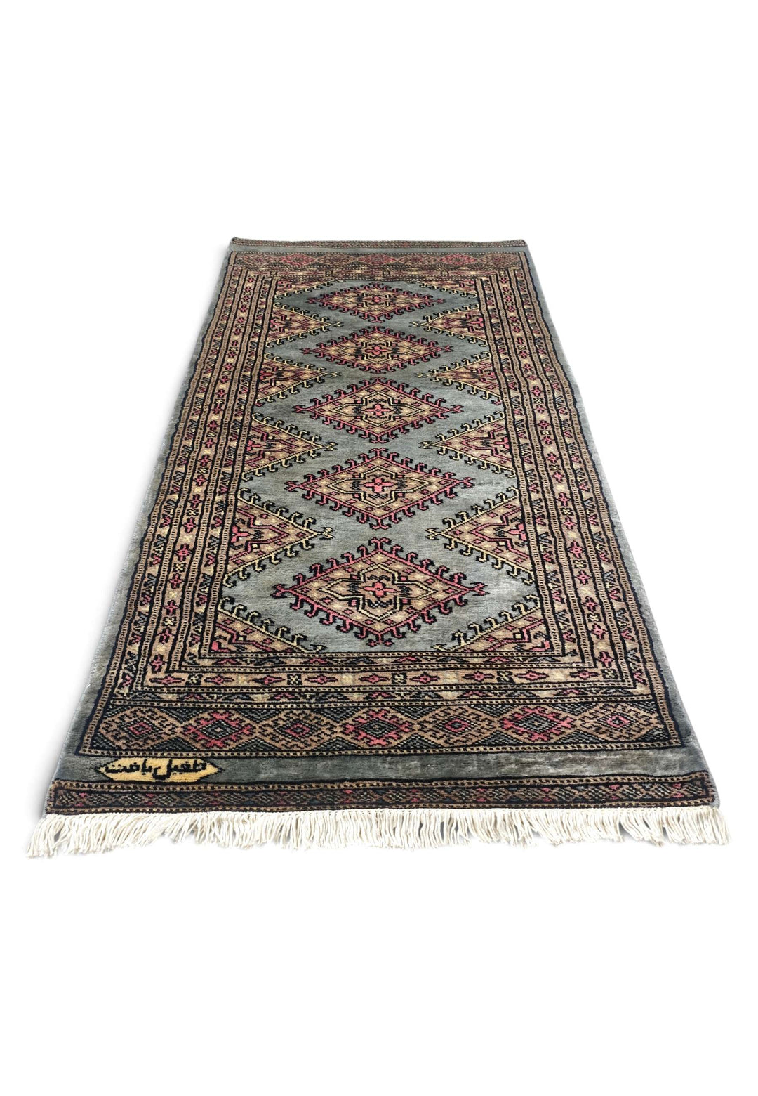 Border detail of grey-green Jaldar hand-knotted Pakistani rug
