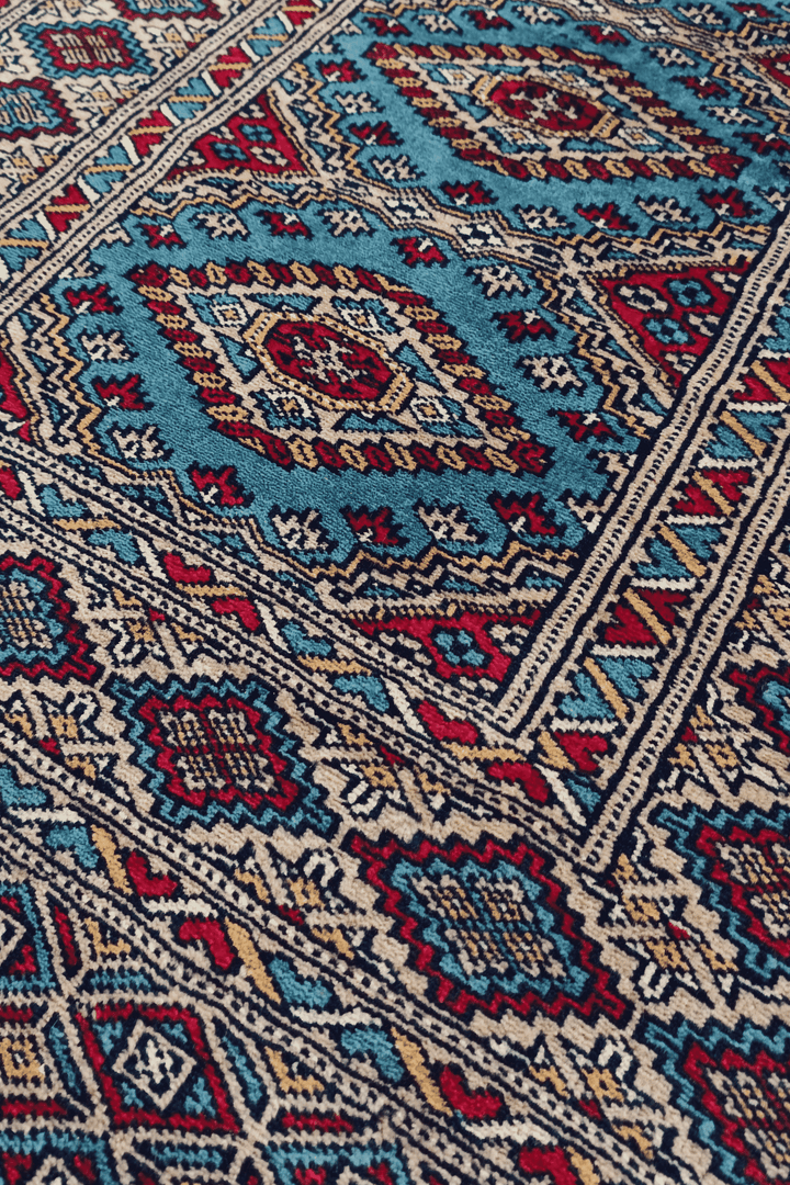 Chained diamond medallion detail in turquoise and wine red