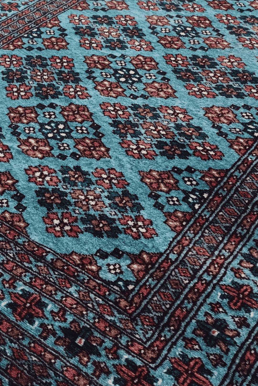 Polychrome lattice detail in turquoise and rose on Jaldar runner