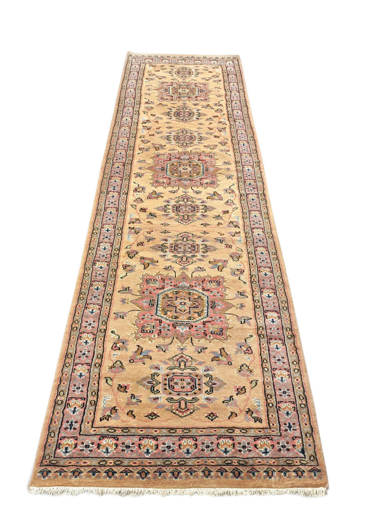 Border detail of golden Jaldar hand-knotted Pakistani runner