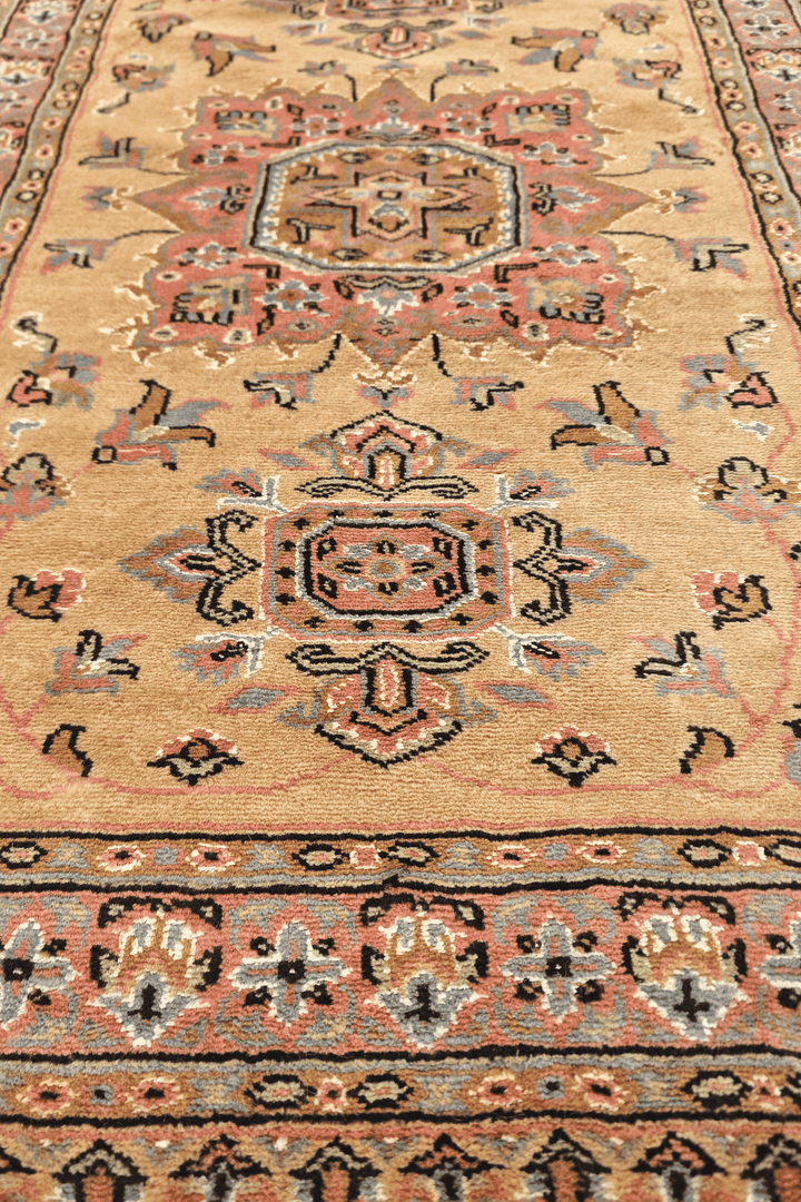 Hand-knotted golden Jaldar runner with silk medallions