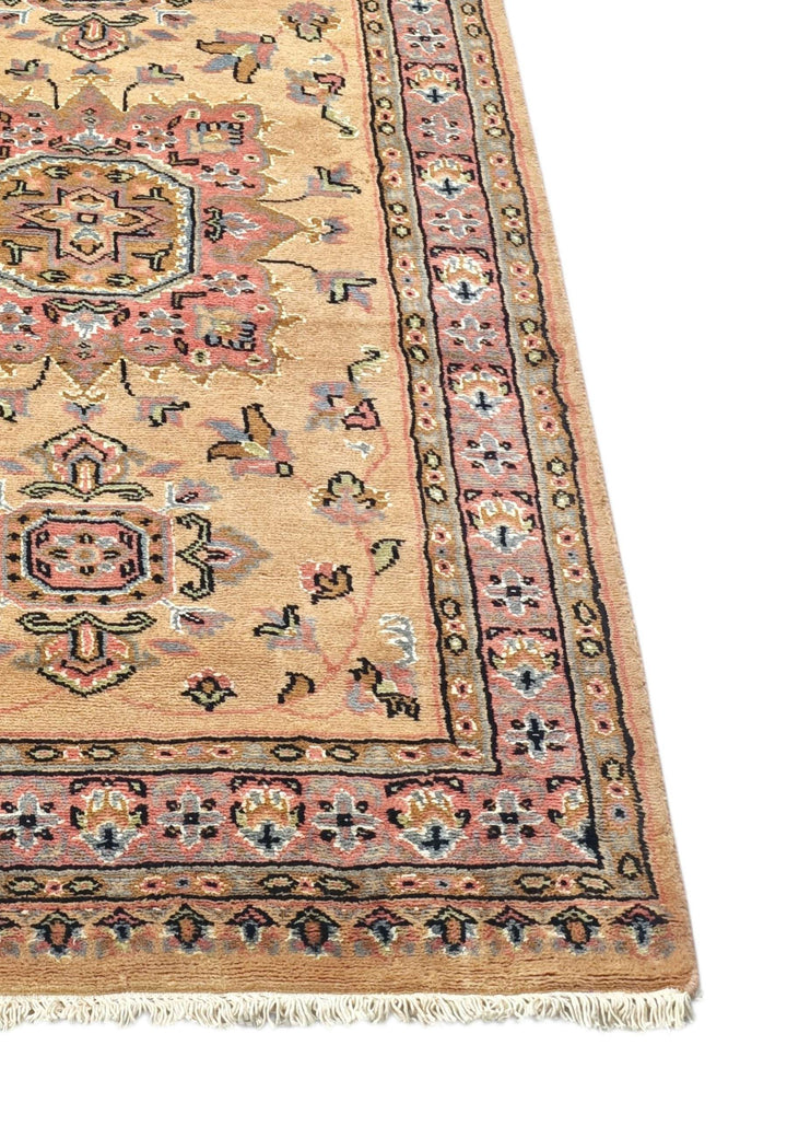 Corner of golden and rose Jaldar hand-knotted runner