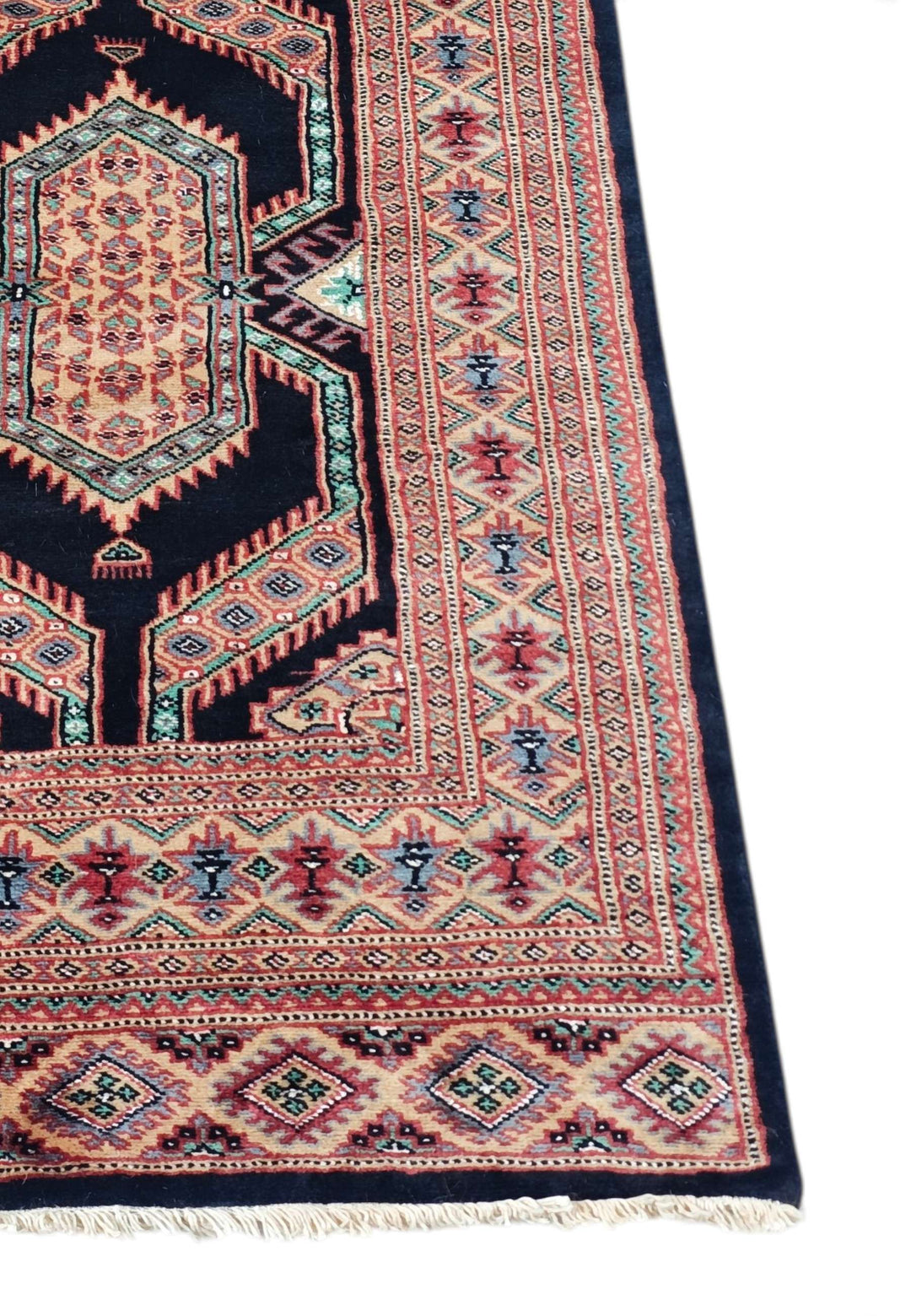 Corner of indigo and camel Jaldar hand-knotted runner