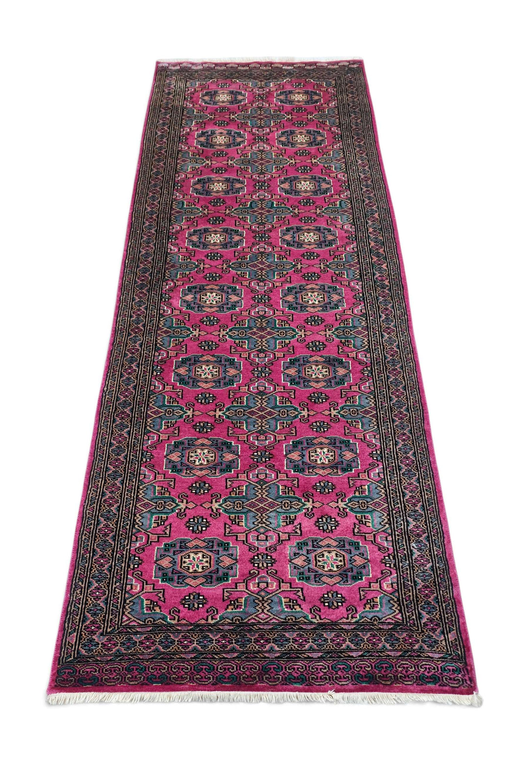 Border detail of magenta Jaldar hand-knotted Pakistani runner