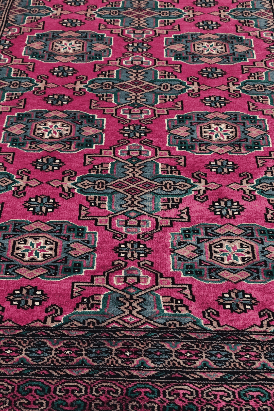 Hand-knotted magenta Jaldar runner with silk rosette güls