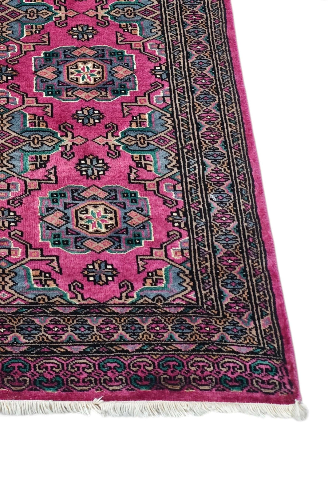 Corner of magenta and teal Jaldar hand-knotted runner