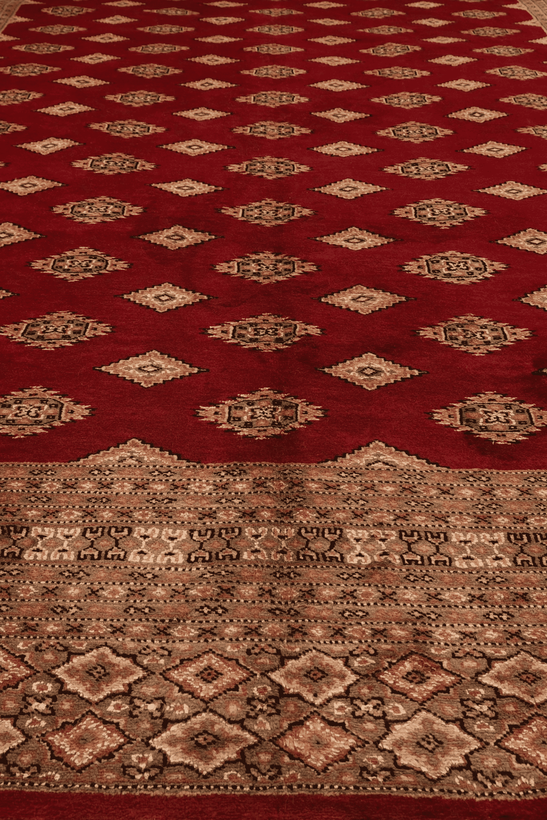 One-of-a-kind signed oxblood and tan Pakistani Jaldar rug