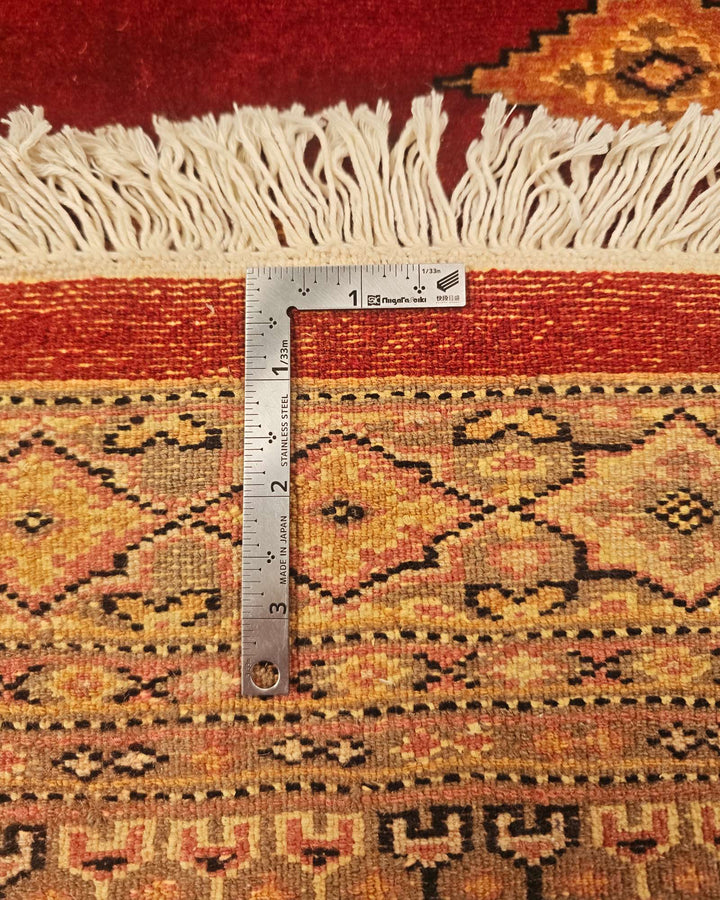 Hand-knotted red Jaldar rug with silk gold diamond güls