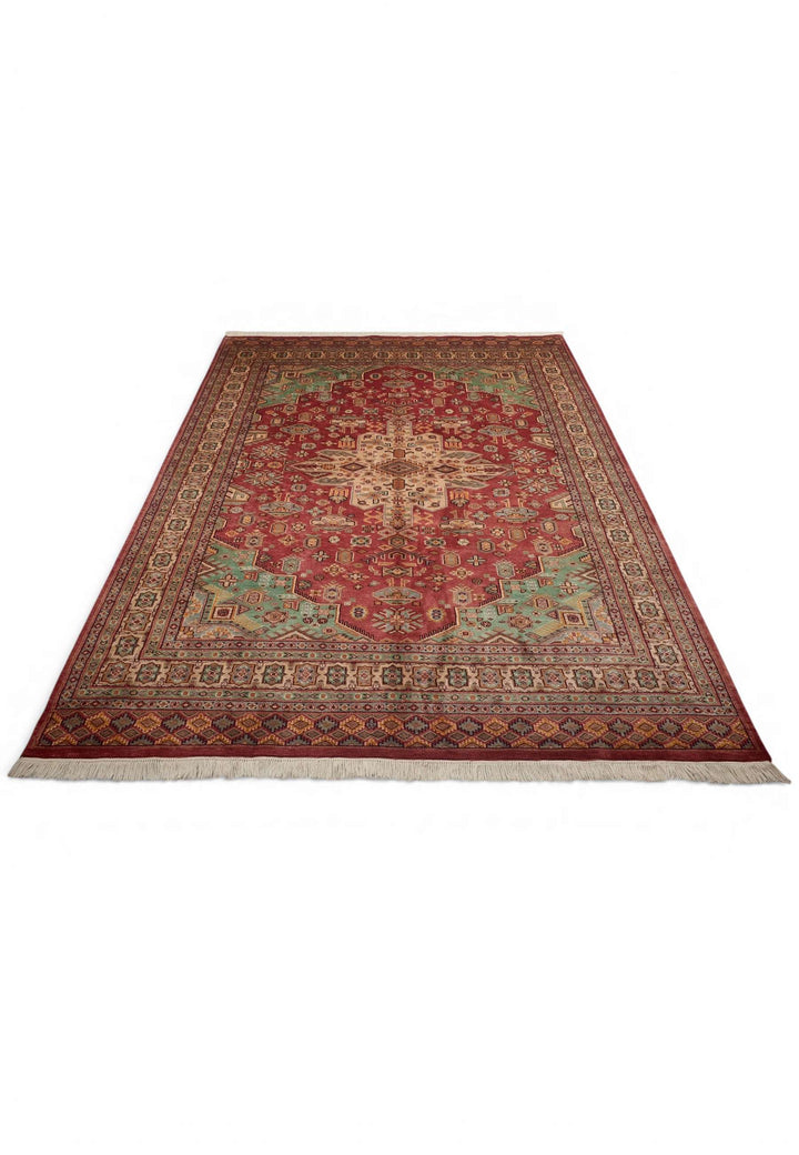 Border detail of rust red hand-knotted Pakistani Jaldar rug