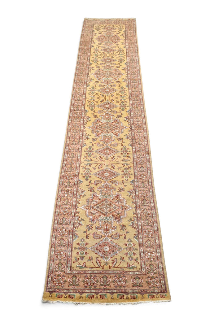 Border detail of wheat gold Jaldar hand-knotted runner