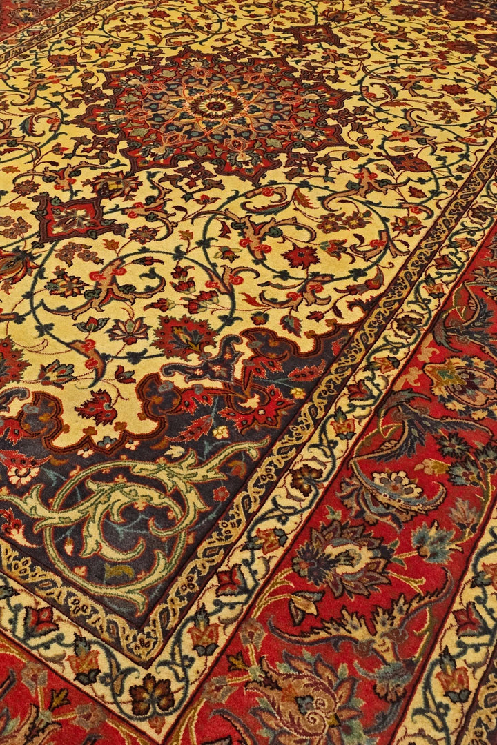 Medallion detail in gold on Sirafian Isfahan rug