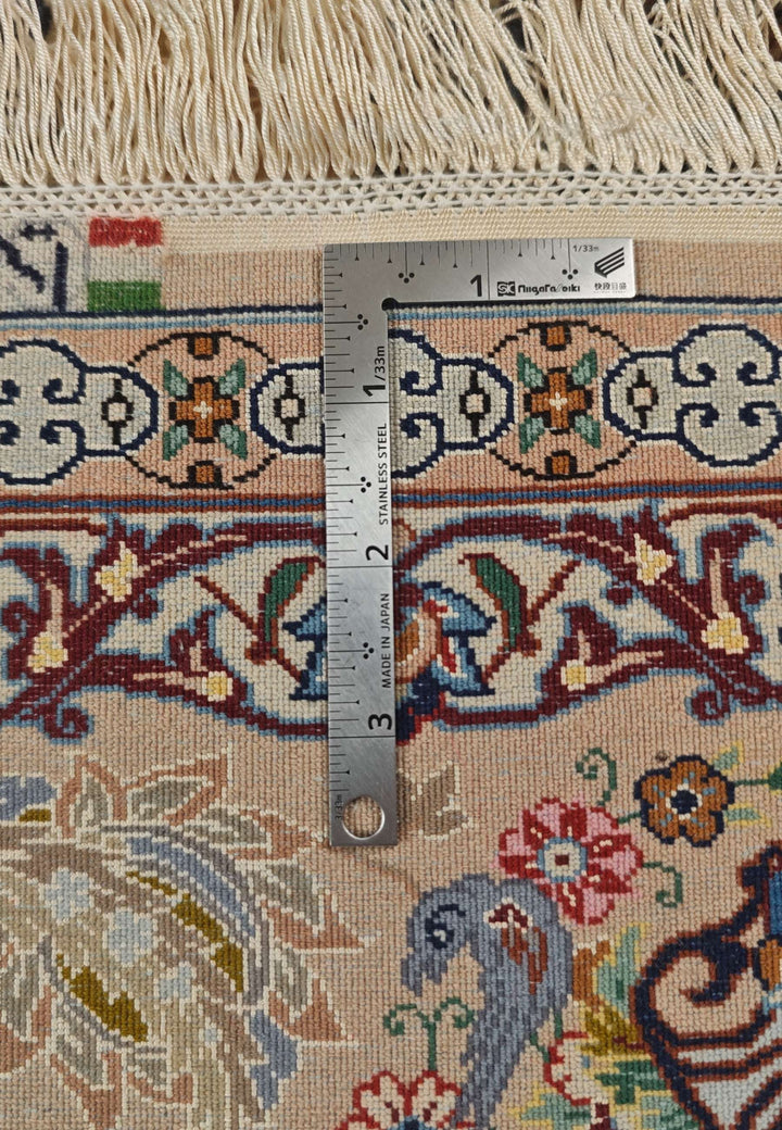 Corner of ivory vase Isfahan Persian rug