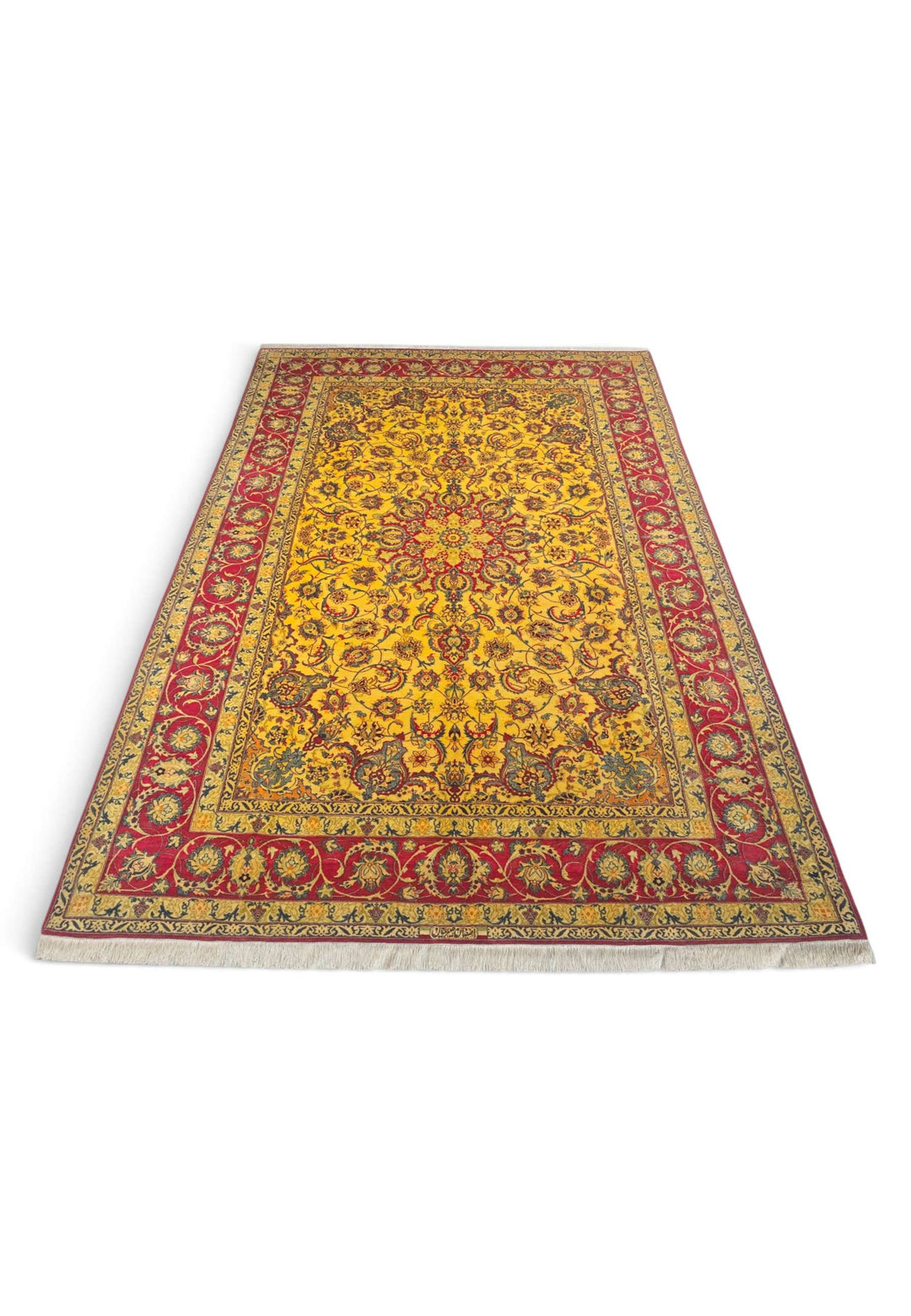 Border detail of gold crimson Isfahan rug