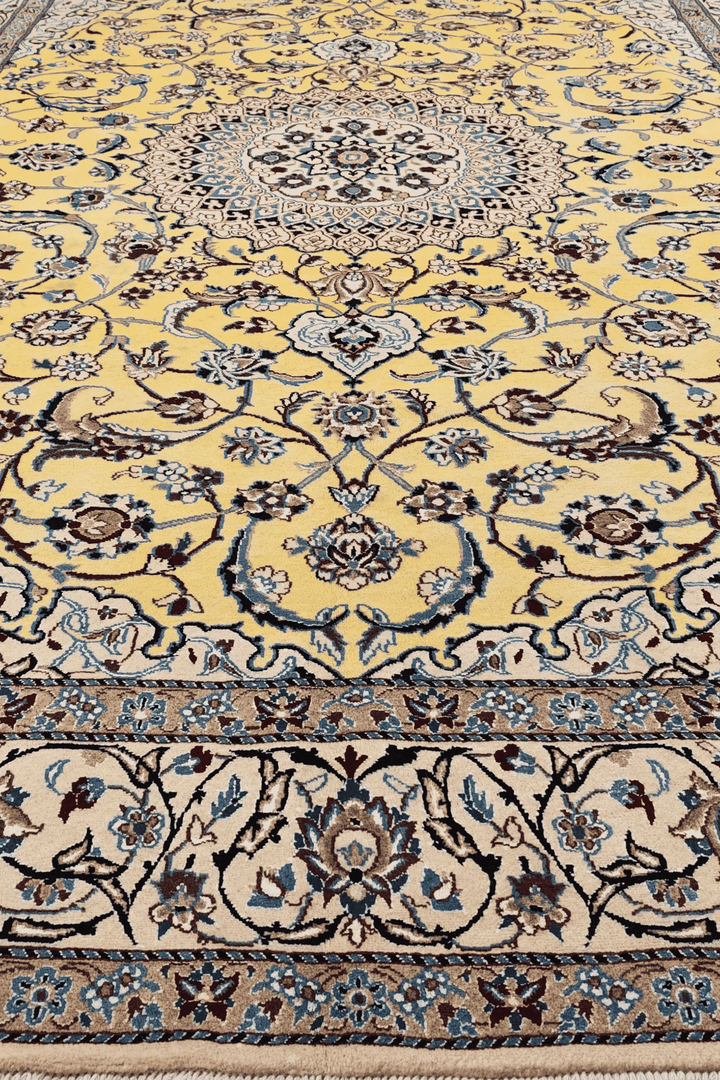 Fringe of saffron Persian Nain rug