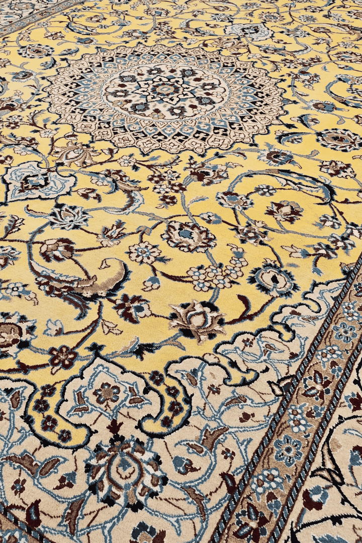 Border detail of saffron Nain hand-knotted rug