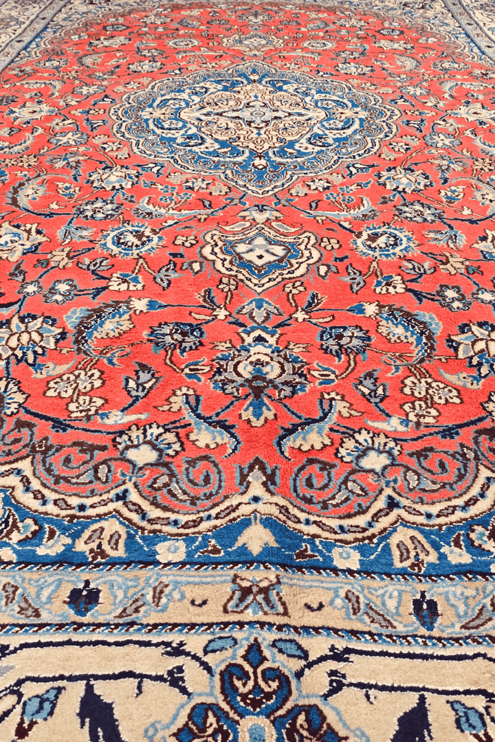 Fringe of coral Persian Nain rug