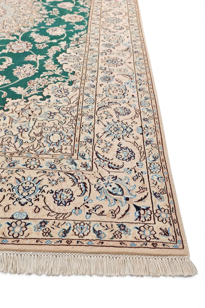 Fringe of teal Persian Nain rug
