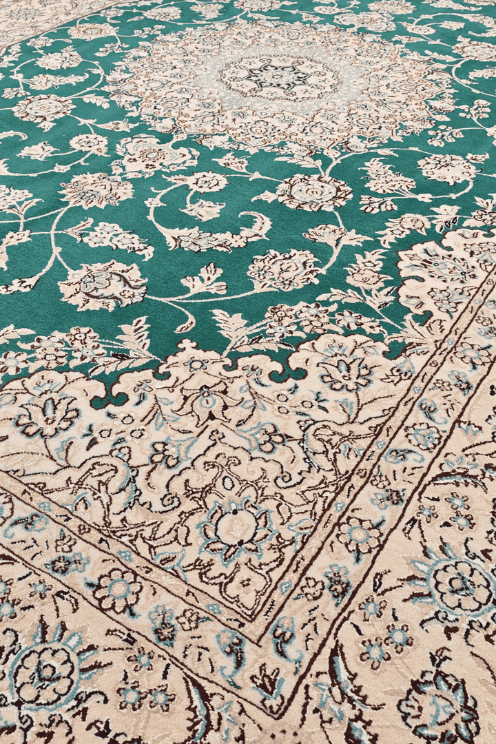 Border detail of teal Nain hand-knotted rug