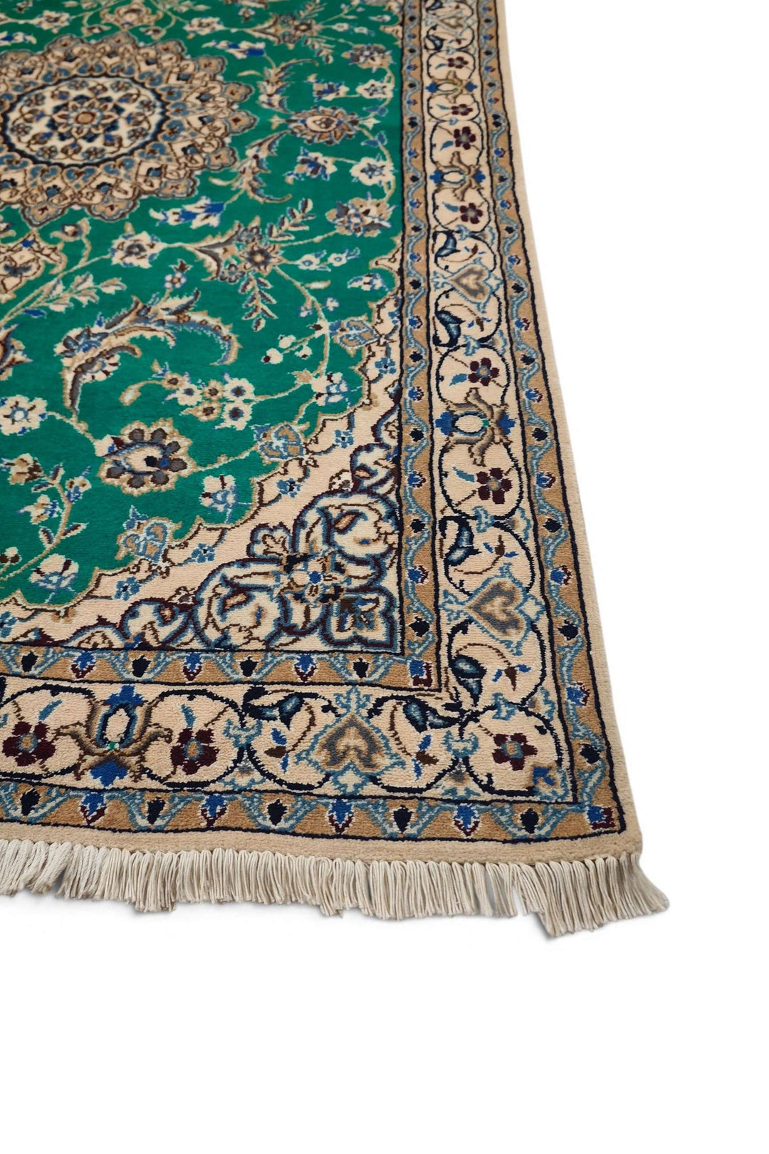 Corner of emerald green Nain hand-knotted rug
