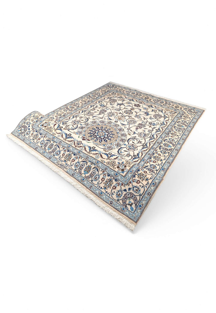 Hand-knotted Persian Nain rug with all-over floral field