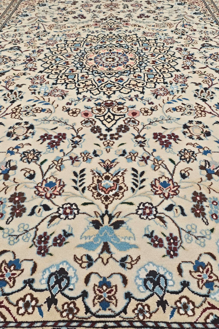Corner of ivory wine Nain hand-knotted rug