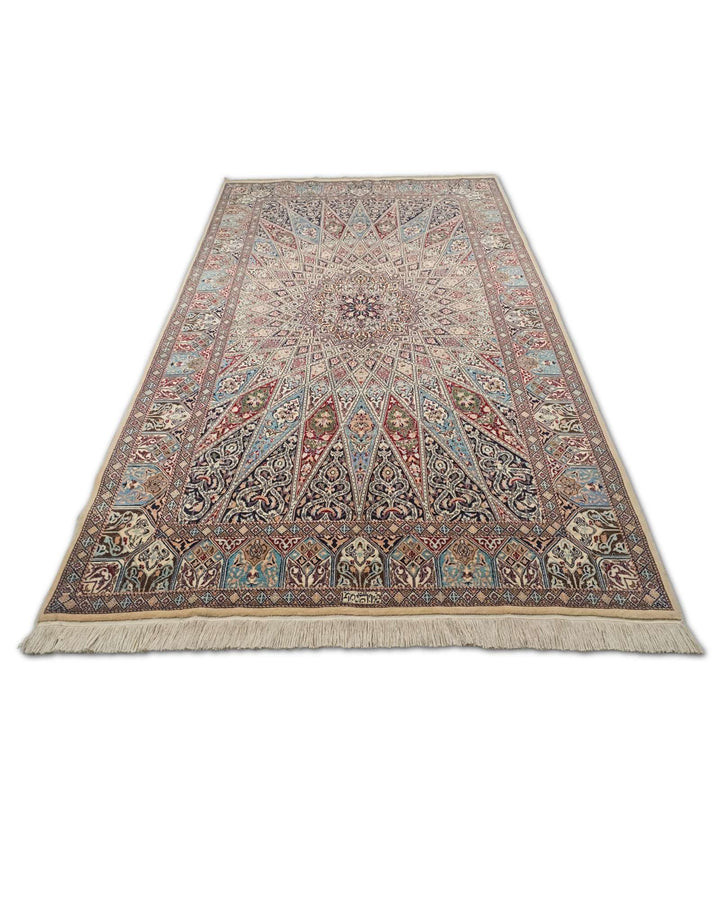 Border detail of ivory blue Gonbad Nain rug