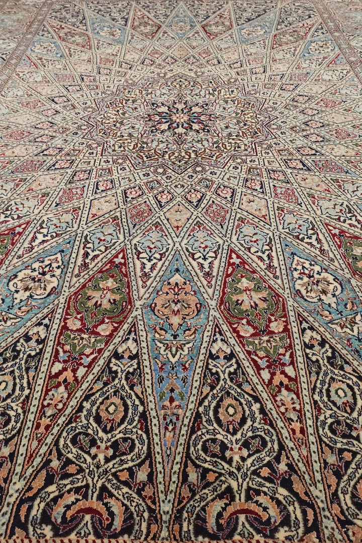 Corner of ivory blue Gonbad Nain rug